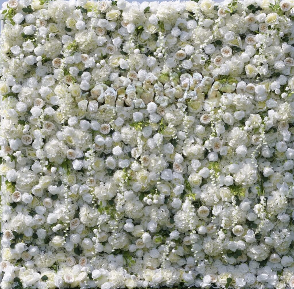 Luxurious 5D white rose flower wall made with high-quality silk flowers – elegant backdrop for weddings, events, and photo booths