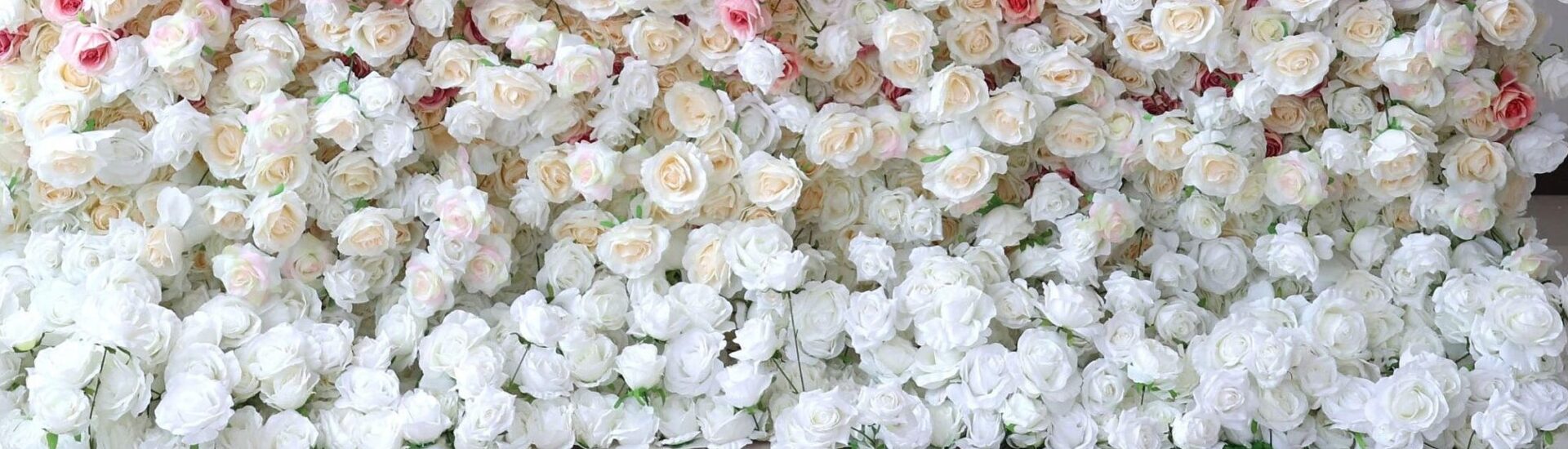 Gradient flower wall with ombré effect using silk flowers – perfect for weddings, parties, and event photo backdrops