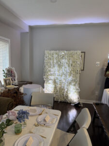 Add a soft, romantic touch to your event with our pink floral wall backdrop. Made with lush, high-quality silk flowers, it's perfect for photo ops, dessert table backdrops, or ceremony decor at birthdays, bridal showers, baby showers, and weddings. Available for rent in multiple sizes.