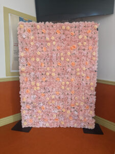 Create a timeless and elegant atmosphere with our white floral wall rental. Perfect as a photo backdrop or ceremony accent for weddings, bridal showers, anniversaries, and more. Designed with high-quality silk flowers for a luxurious, full look that enhances any venue.