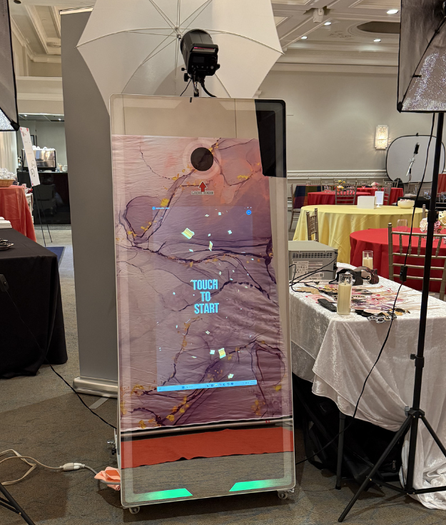 Interactive 65-inch mirror photo booth with instant prints, QR code sharing, and high-quality camera