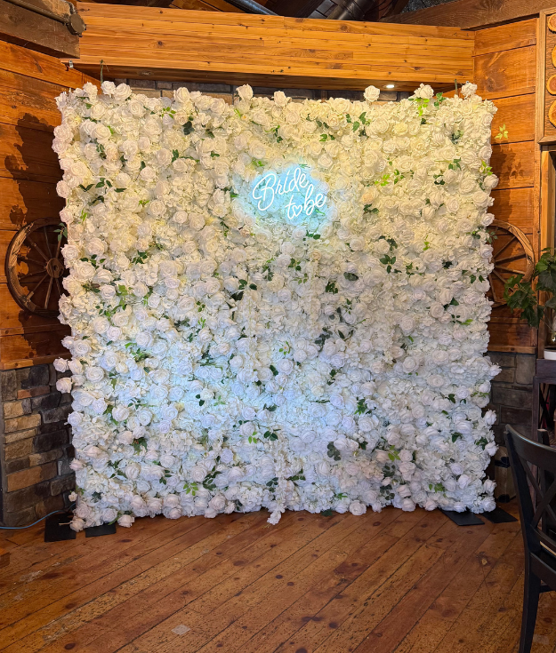 Elegant white flower wall backdrop for bridal shower event decoration